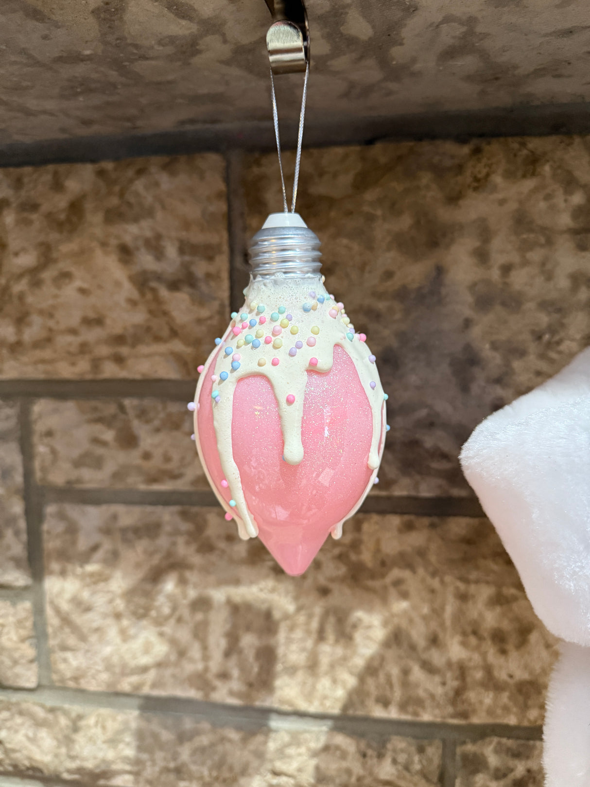 Icing covered glitter ornament